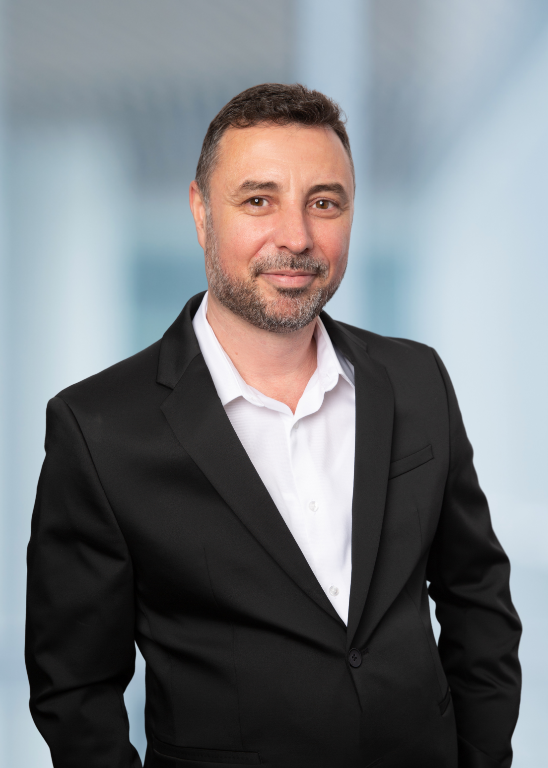 Headshot of Orgest Lushnja, Eagles World Realty's Founder and Broker